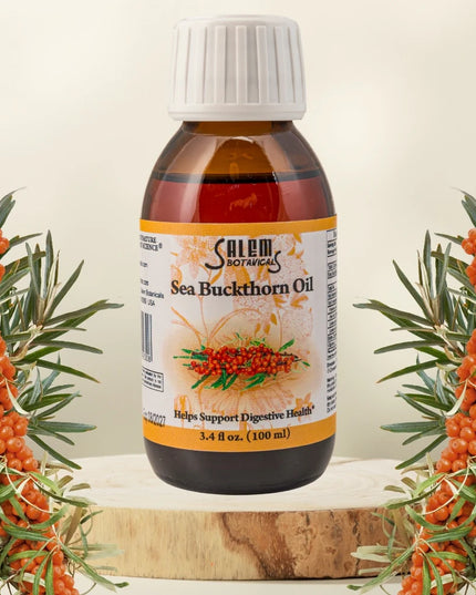 Bottle of Salem Naturals Sea Buckthorn Oil with sea buckthorn berries and branches on a light background