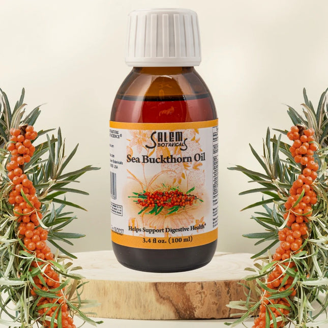 Bottle of Salem Naturals Sea Buckthorn Oil with sea buckthorn berries and branches on a light background