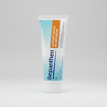 BEPANTHEN® Antiseptische Wundcreme is a German pharmaceutical wound cream specially formulated for the antiseptic treatment of superficial wounds and prevention of wound infections. The dual-action formula combines Chlorhexidine, an effective antiseptic agent, with Dexpanthenol (Provitamin B5) to support natural skin regeneration and healing. It is ideal for minor cuts, scrapes, abrasions, scratches, and superficial skin injuries. The cream provides a pleasant cooling effect and absorbs quickly into the ski