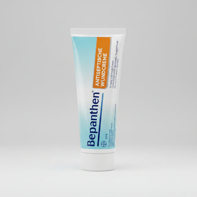 BEPANTHEN® Antiseptische Wundcreme is a German pharmaceutical wound cream specially formulated for the antiseptic treatment of superficial wounds and prevention of wound infections. The dual-action formula combines Chlorhexidine, an effective antiseptic agent, with Dexpanthenol (Provitamin B5) to support natural skin regeneration and healing. It is ideal for minor cuts, scrapes, abrasions, scratches, and superficial skin injuries. The cream provides a pleasant cooling effect and absorbs quickly into the ski