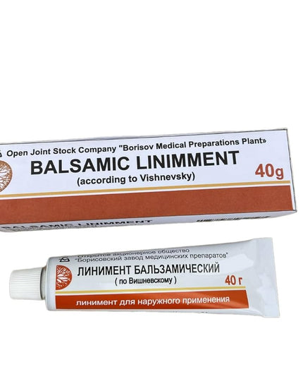 Balsamic liniment packaging with tube on a white background