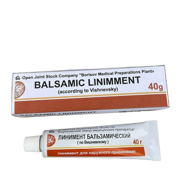 Balsamic liniment packaging with tube on a white background