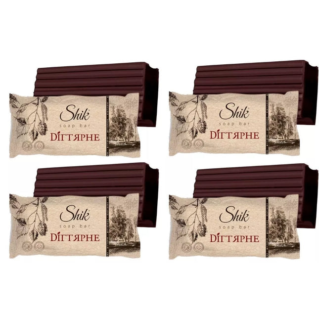 Four packages of Shik soap bars with decorative labels on a white background