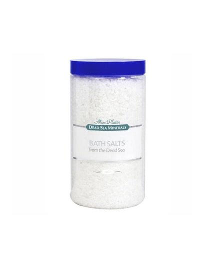 Jar of bath salts with a blue lid on a white background