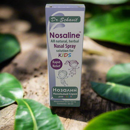 Dr. Schavot Nosaline nasal spray for kids on a natural background with leaves.