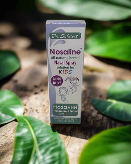 Dr. Schavot Nosaline nasal spray for kids on a natural background with leaves.