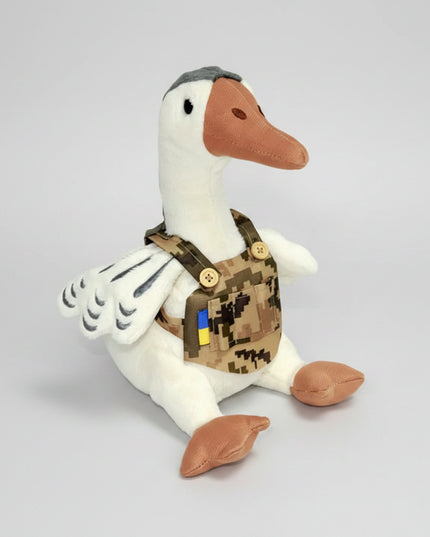 Goose "Defender", Tigres is a designer toy in a plate holder. &nbsp;The goose is dressed in an improvised plate carrier decorated with the flag of Ukraine. &nbsp;The wings of the "Defender" are decorated with embroidery. &nbsp;Thanks to the unusual armor, this toy is different from others, it will be a great gift or souvenir.