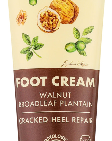 Tube of Green Pharmacy foot cream with walnut and broadleaf plantain on a beige background