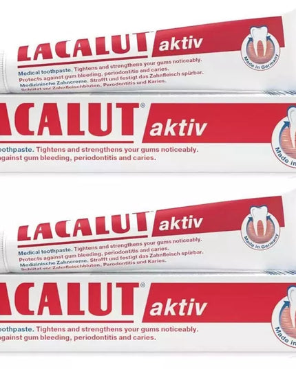 Four tubes of Lacalut aktiv toothpaste on a white background