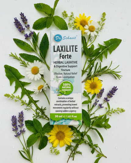 Laxilite Forte herbal laxative packaging surrounded by various herbs and flowers on a white background