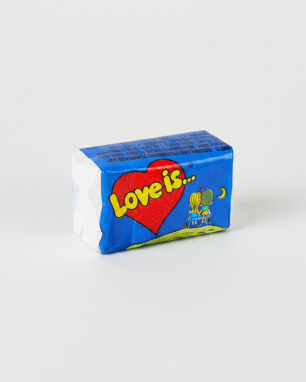 Love Is… Chewing Bubble Gum is the iconic Turkish bubble gum remembered for its colorful wrappers, fruity flavor combinations, and charming “Love Is…” collectible comic inserts.