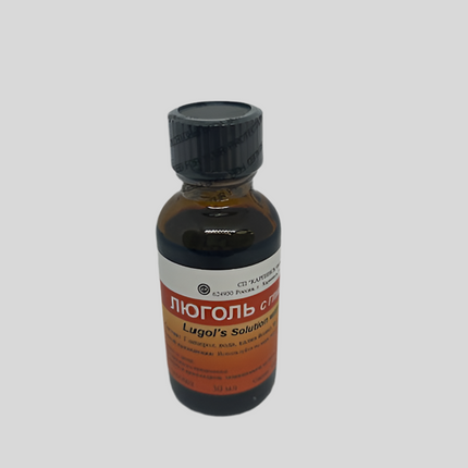 Bottle of Lugol's Solution on a gray background