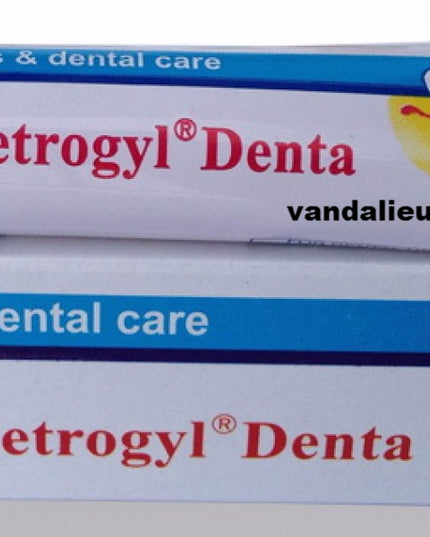 Metrogyl Denta dental care gel packaging on a white background