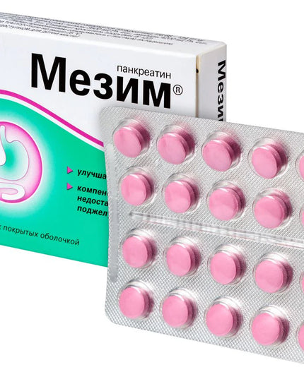 Pink tablets in a blister pack with their packaging on a white background