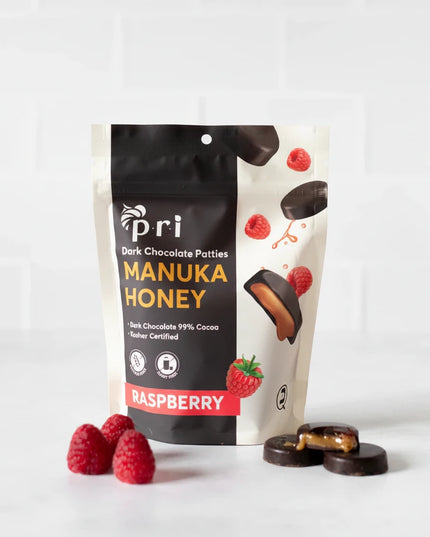 PRI Manuka Honey Coffee Chocolate Patties are premium dark chocolate treats crafted with high-quality ingredients, combining rich dark chocolate, aromatic Arabica coffee, and authentic New Zealand Manuka honey (MGO 60+).