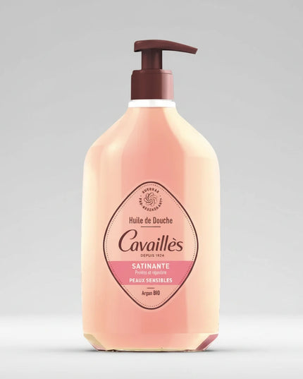 A luxurious cleansing shower oil specially formulated for dry, sensitive, and delicate skin. Rogé Cavaillès Satin Shower Oil gently cleanses while helping to nourish and protect the skin's natural hydrolipidic barrier. Enriched with organic argan oil and pro-regenerating plant surgras, the silky oil transforms into a rich, velvety foam that leaves skin soft, comfortable, and delicately scented with elegant rose notes. Suitable for the entire family from 1 year of age. Dermatologically tested and formulated 