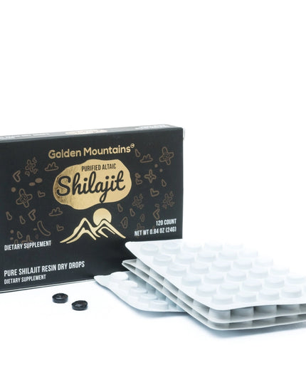 Box of Golden Mountains Shilajit with resin drops on a white background