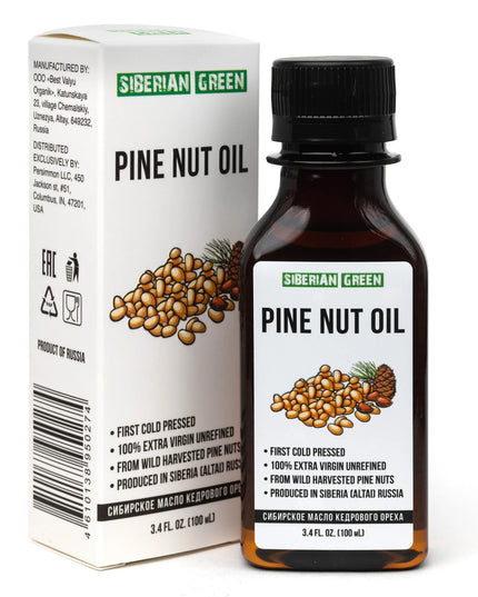 Bottle and box of Siberian Green Pine Nut Oil on a white background