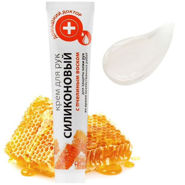 Tube of silicone cream with honeycomb and honey on a white background