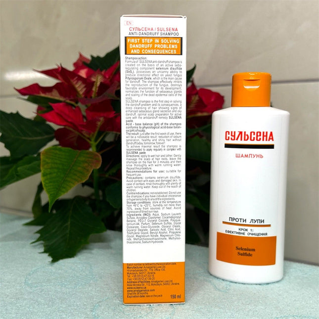 Sulcena shampoo bottle and packaging with a poinsettia plant in the background