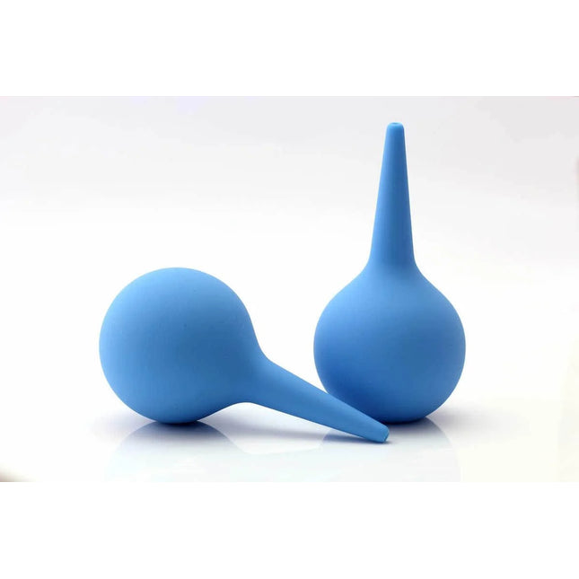 Two blue silicone enemas on a white background