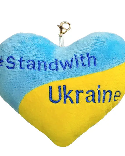 Heart-shaped plush keychain with '#Standwith Ukraine' text on a white background