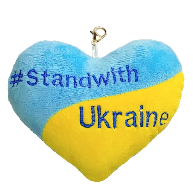Heart-shaped plush keychain with '#Standwith Ukraine' text on a white background