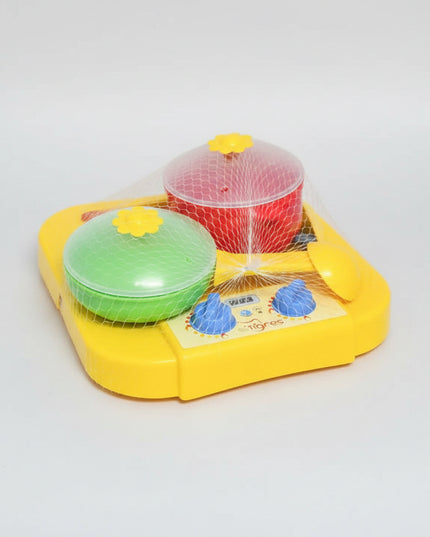 The dinner set "Chamomile" with kitchen is made from safe food plastic. It is suitable for use in the microwave oven as well as the dishwasher. &nbsp;&nbsp;
The dinner set "Chamomile" with kitchen includes a gas stove with two hot plates and a stand for kitchen utensils, one pan and a frying pan, a soup ladle, a slotted spoon, and two spatulas. &nbsp;In front of each burner, there is a switch, when you turn it on you hear a click. &nbsp;The handle of the pan is removed.&nbsp;