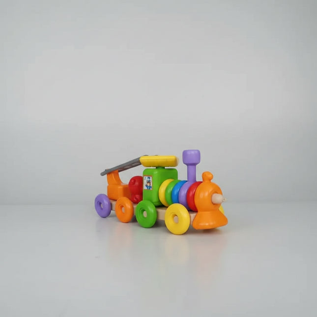 The educational toy "Funny Train" is intended for the early development of children. "FunnyTrain" is a functional toy to promote the development of fine motor skills of the hands, memory, attention, and intelligence. Usually, a child starts playing at the age of six months when he tries or already knows how to sit, by stringing the rings on the rod, forming the basis of the train, the child develops coordination of movements, gets acquainted with colors, learns to compare objects with each other, looking fo