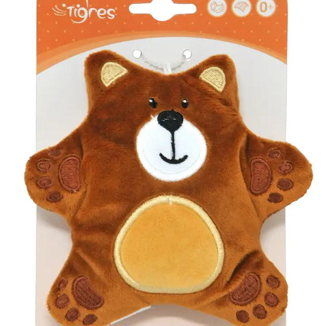 Brown bear-shaped plush toy with a white face on a beige background