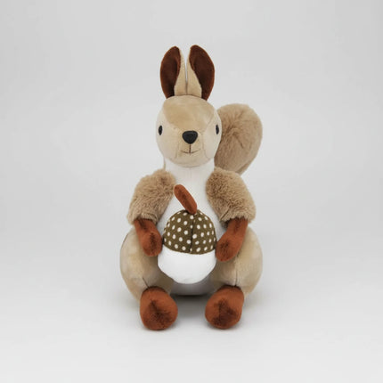 Plush toy squirrel holding a pine cone 