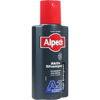 Alpecin shampoo bottle with red cap on a white background