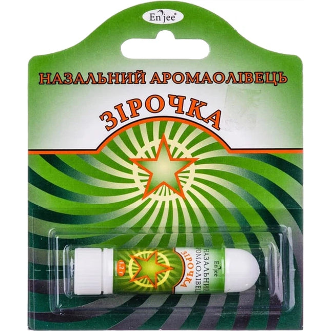 Packaged nasal inhaler with green and orange design on a white background