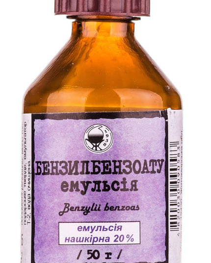 Bottle of benzyl benzoate emulsion with a purple label on a white background
