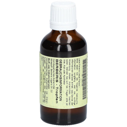 Bottle of Berberis Tropfen with a white cap on a white background