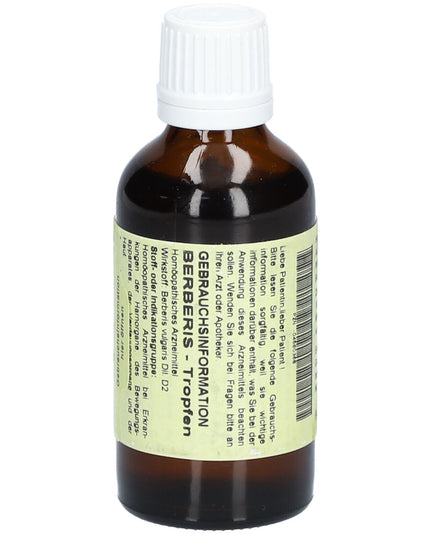 Bottle of Berberis Tropfen with a white cap on a white background