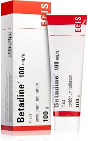 Betadine 100 mg/g antiseptic solution tube and box on a white background