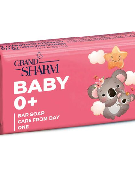 Pink baby soap bar with koala design and 'Grand Sharm' branding on a white background