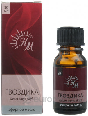 Bottle and box of caryophyllus essential oil with NMM logo