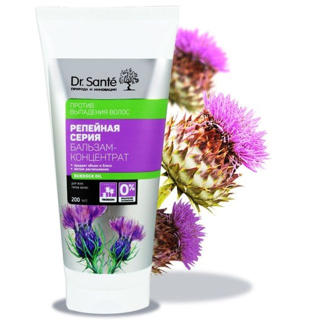 Dr. Sante hair care product with thistle flowers on a white background