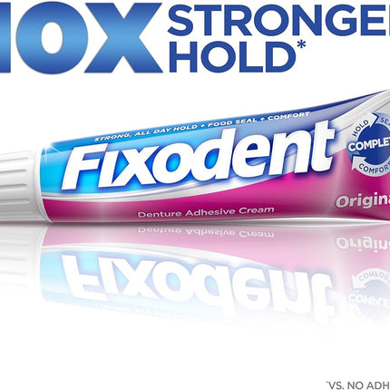 Fixodent denture adhesive cream tube with '10X Stronger Hold' text on a white background