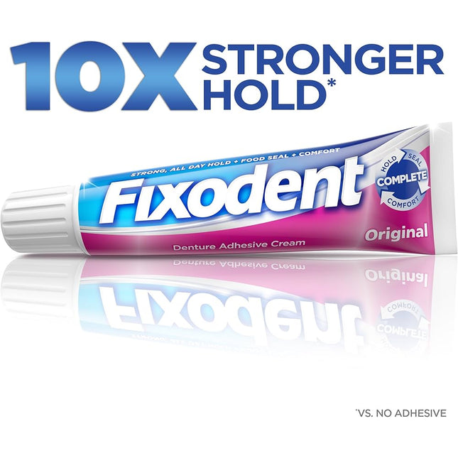 Fixodent denture adhesive cream tube with '10X Stronger Hold' text on a white background