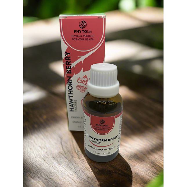 Bottle and box of PhytoLab Hawthorn Berry on a wooden surface