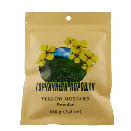 Yellow mustard powder package with flowers on a beige background