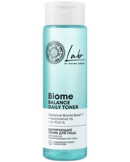 Biome Balance Daily Toner bottle with a white cap on a light blue background