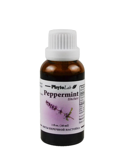 Peppermint tincture bottle with a white cap on a white background