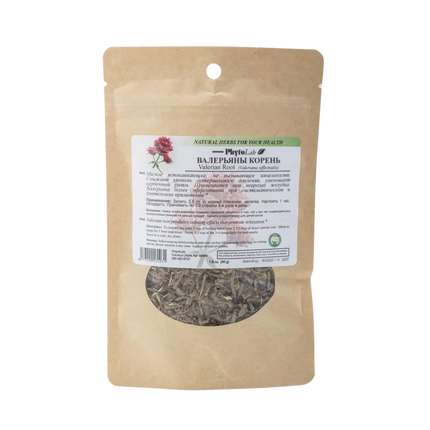 Brown paper bag with dried herbs and a label on a white background