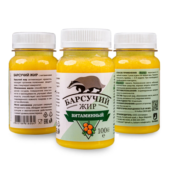 Three bottles of a vitamin product with Russian text and a bear logo on a white background