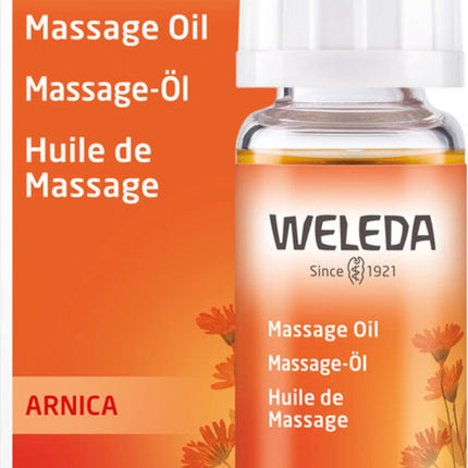 Weleda Arnica massage oil bottle and packaging on a white background