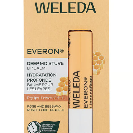 Weleda Everon Deep Moisture Lip Balm packaging on a beige background